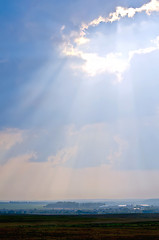 Image showing Ray of sunshine through the clouds