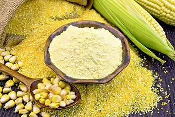 Image showing Flour corn in bowl with grits and grain on board