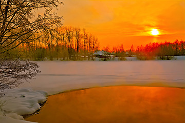 Image showing Sunset on river in winter