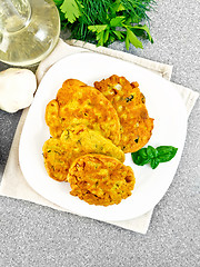 Image showing Flapjack chickpeas with zucchini in plate on granite table top