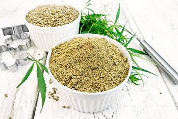 Image showing Flour hemp and grain in bowls on light board