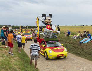 Image showing Mickey Mouse Caravan on a Cobblestone Road- Tour de France 2015