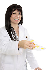 Image showing Pharmacist with prescription and medicine