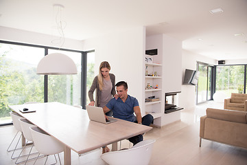 Image showing couple using laptop at home