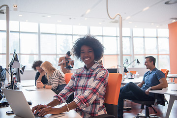 Image showing African American informal business woman working in the office