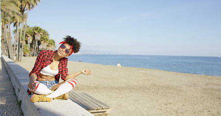 Image showing Sexy fashionable young woman at the seaside