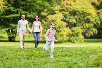 Image showing happy family walking in summer park and having fun