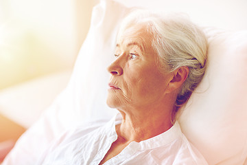 Image showing senior woman patient lying in bed at hospital ward