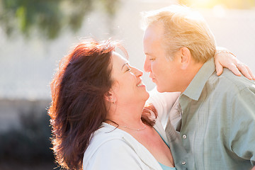 Image showing Middle Aged Couple Enjoy A Romantic Slow Dance Outside