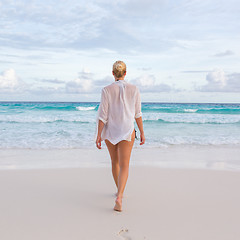 Image showing Woman on summer vacations at tropical beach of Mahe Island, Seychelles.