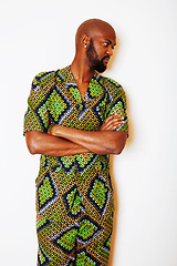 Image showing portrait of young handsome african man wearing bright green nati