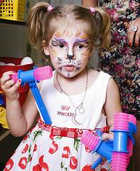 Image showing little girl with faceart on birthday party, lifestyle people concept
