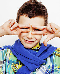 Image showing young pretty little cute boy kid wondering, posing emotional face isolated on white background, gesture happy smiling close up, lifestyle people concept