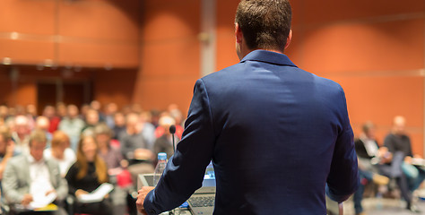 Image showing Public speaker giving talk at Business Event.