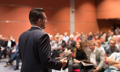 Image showing Speaker giving talk at business conference event.