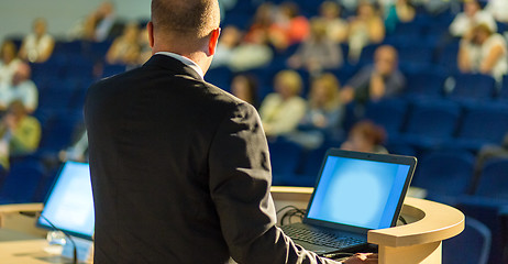 Image showing Public speaker giving talk at business event.