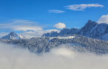 Image showing Peaks Over the Clouds