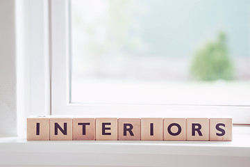 Image showing Wooden interior sign in a bright room