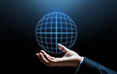 Image showing close up of businessman hand with hologram