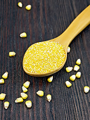 Image showing Corn grits in spoon on board