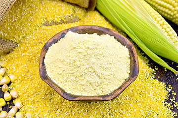 Image showing Flour corn in bowl with grains on board