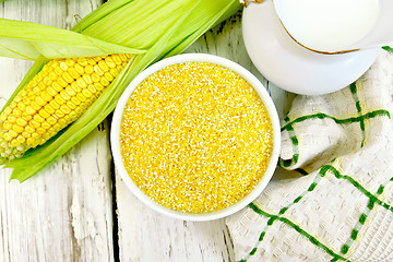 Image showing Corn grits in bowl on board top