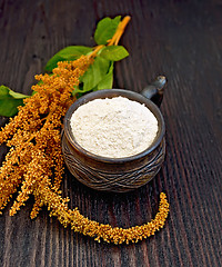 Image showing Flour amaranth in clay cup on board