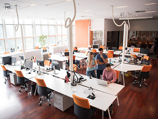 Image showing Group of young people employee workers with computer