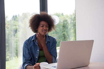 Image showing African American woman in the living room