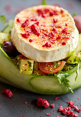 Image showing close up of goat cheese salad with vegetables