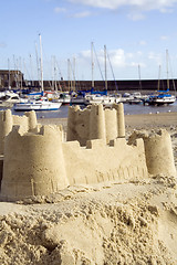 Image showing Sandcastle and harbour