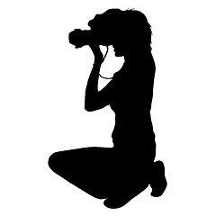 Image showing Cameraman with video camera. Silhouettes on white background. illustration