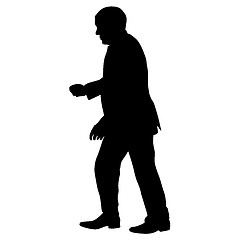 Image showing Silhouette of a man with his hand raised. illustration