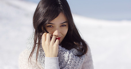 Image showing Happy cute asian girl enjoying her winter time