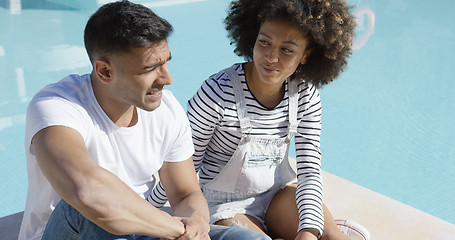 Image showing Attractive African couple chatting in the sun