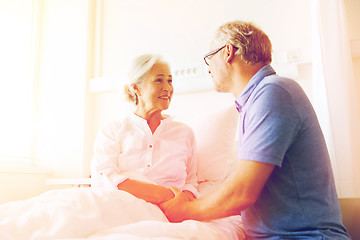 Image showing senior couple meeting at hospital ward