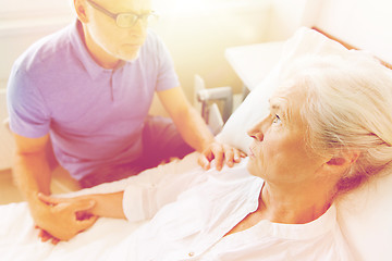 Image showing senior couple meeting at hospital ward