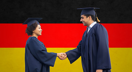 Image showing happy students or bachelors greeting each other