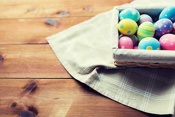 Image showing close up of colored easter eggs in basket