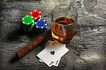 Image showing Cigar, chips for gamblings, drink and playing cards