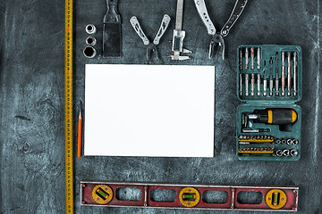 Image showing The set of construction tools on wooden table