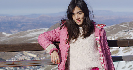 Image showing Attractive young woman on ski holiday