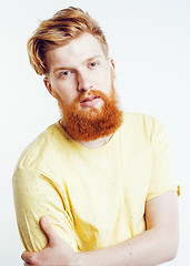 Image showing young handsome hipster ginger bearded guy looking brutal isolated on white background, lifestyle people concept 