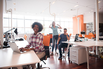 Image showing African American informal business woman working in the office