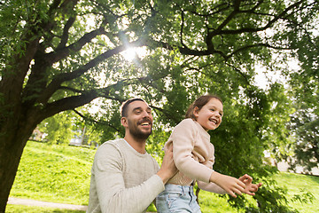 Image showing happy family having fun in summer park