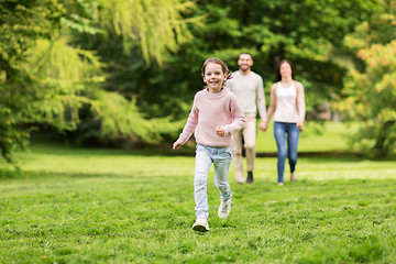 Image showing happy family walking in summer park and having fun