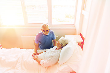 Image showing senior couple meeting at hospital ward