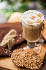 Image showing coffee latte cup with cookies