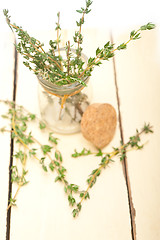 Image showing fresh thyme on a glass jar