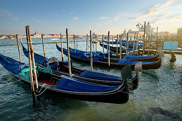 Image showing Venetian gondolas at sunset